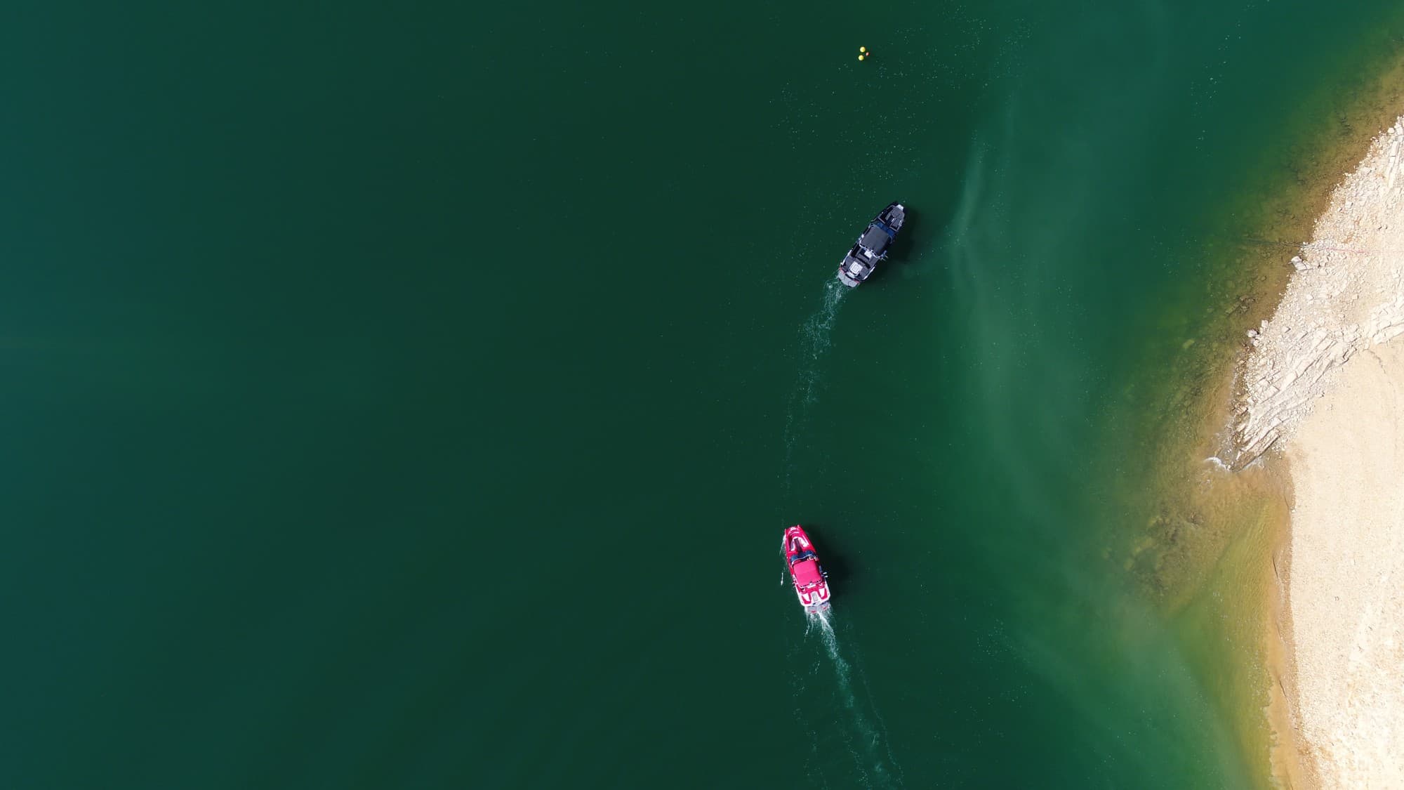 Aerial view of two Sidewake boats on Castelo de Bode lake